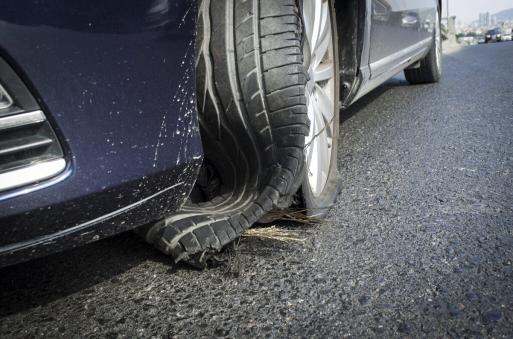 Tire blowouts can cause sudden loss of control.